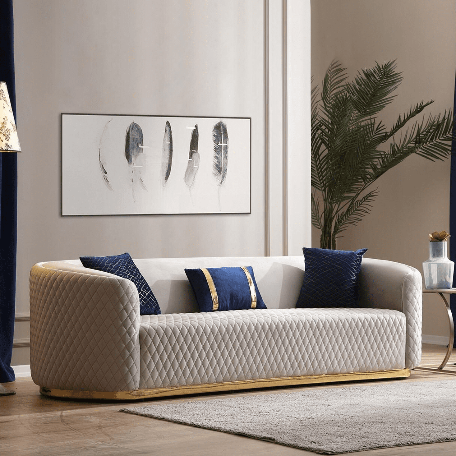 Luxury three-seater sofa with stainless steel frame